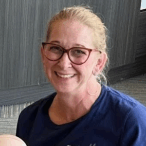 blond woman with glasses